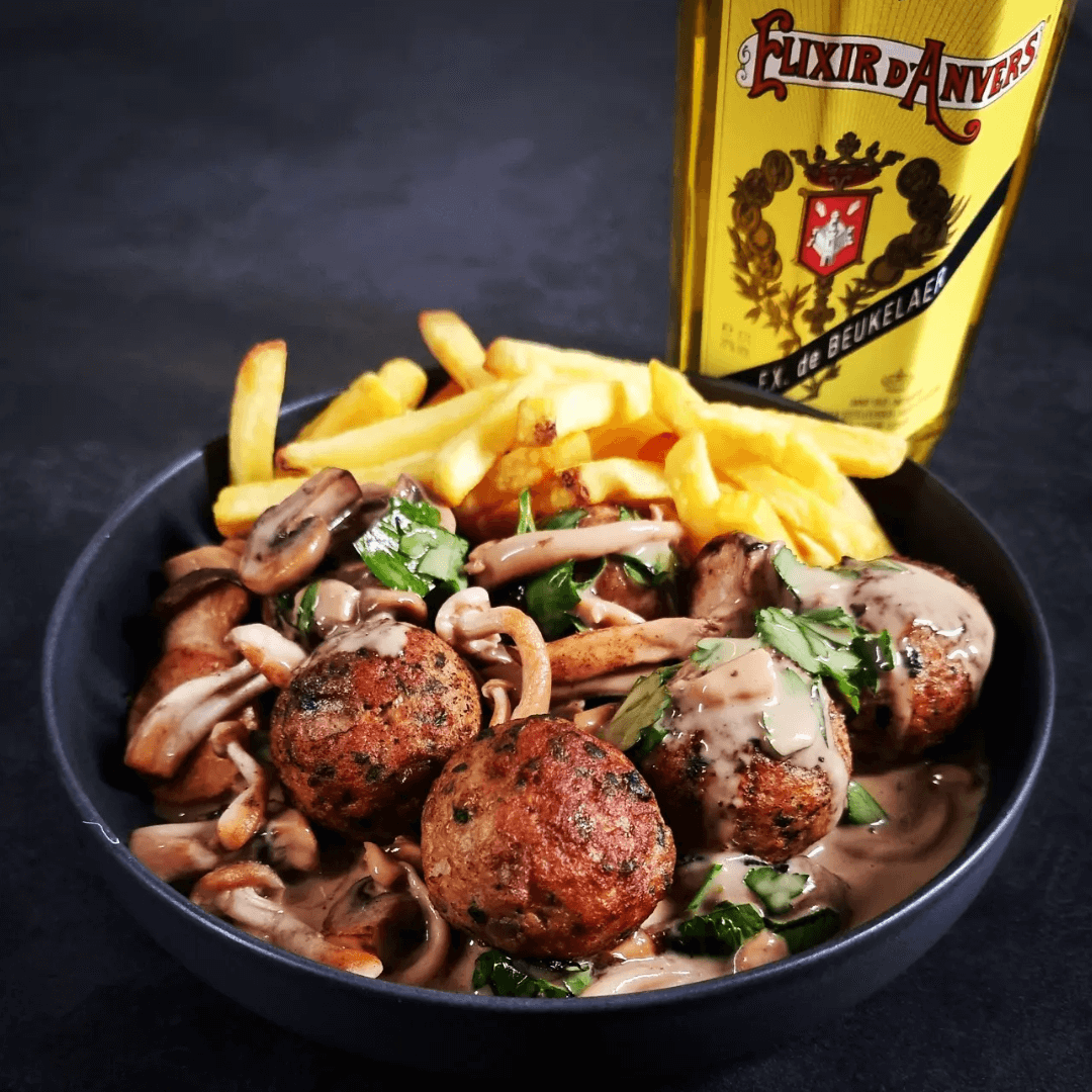 Ambachtelijke Belgische gehaktballetjes met Elixir d’Anvers in romige champignonsaus – Keurslager De Meulder Brasschaat