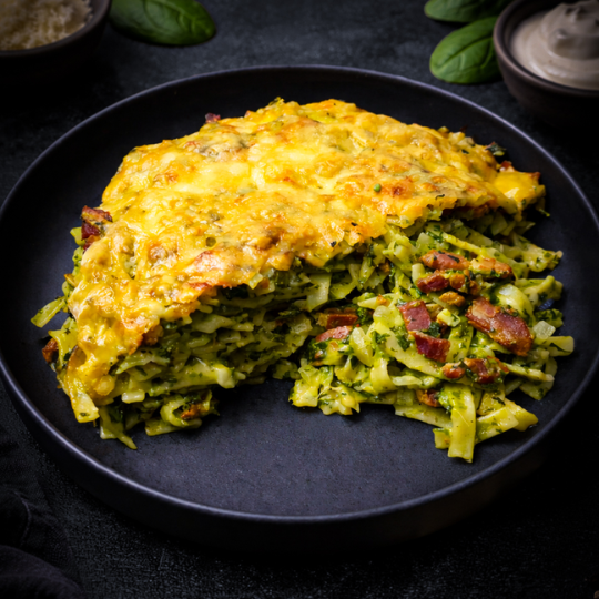 Groene spaghetti uit de oven met spinazie, buikspek en gesmolten kaas, familierecept van Keurslager De Meulder uit Brasschaat