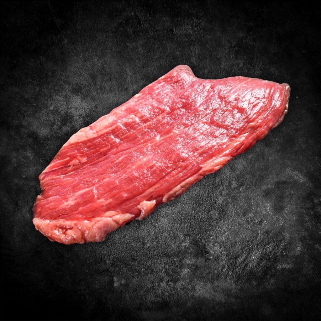 Bavette of vanglap van rundvlees op donkere achtergrond